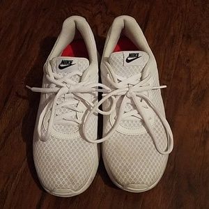 All white Nike shoes size 8